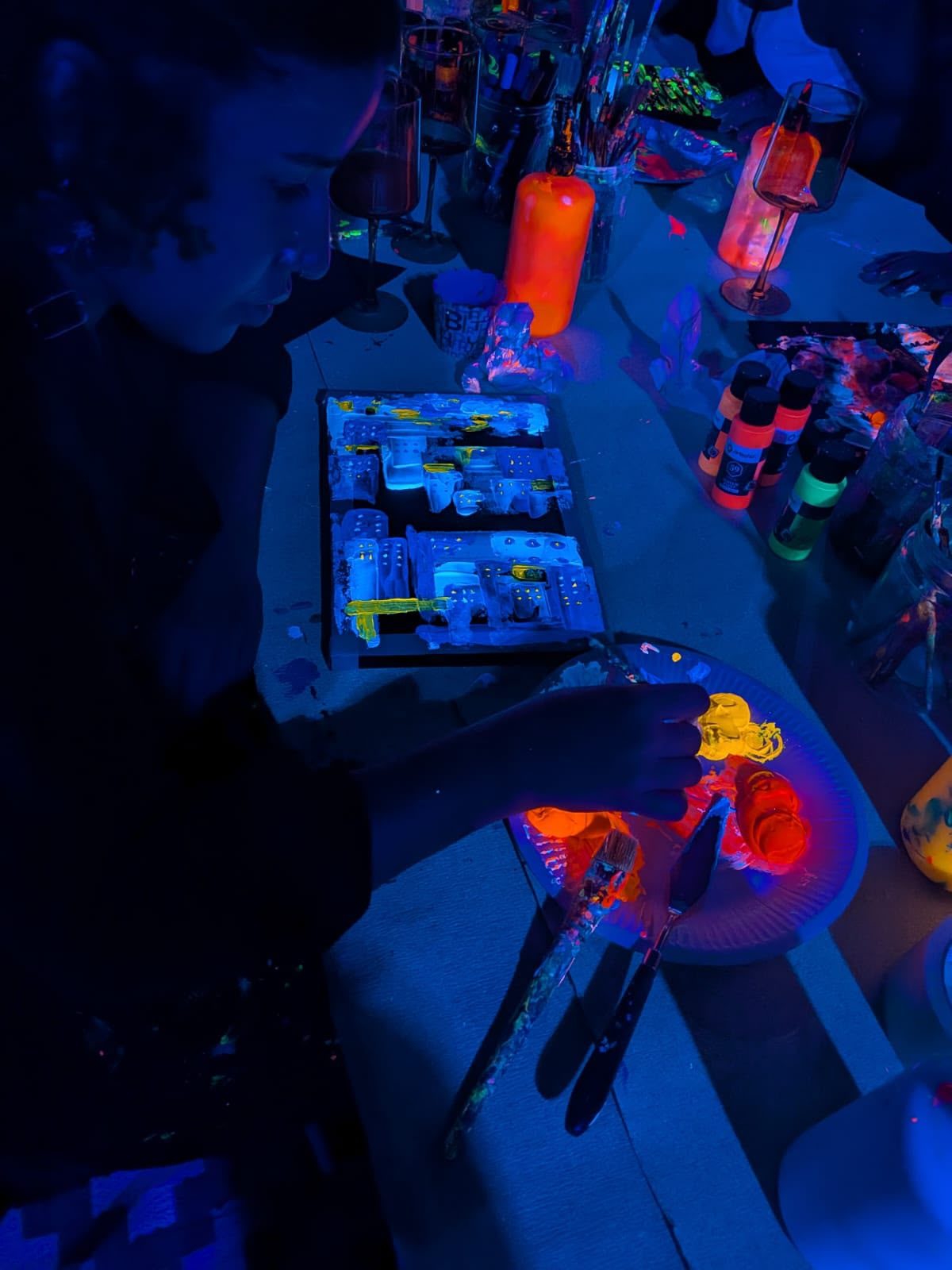 Neon painting workshop under black light